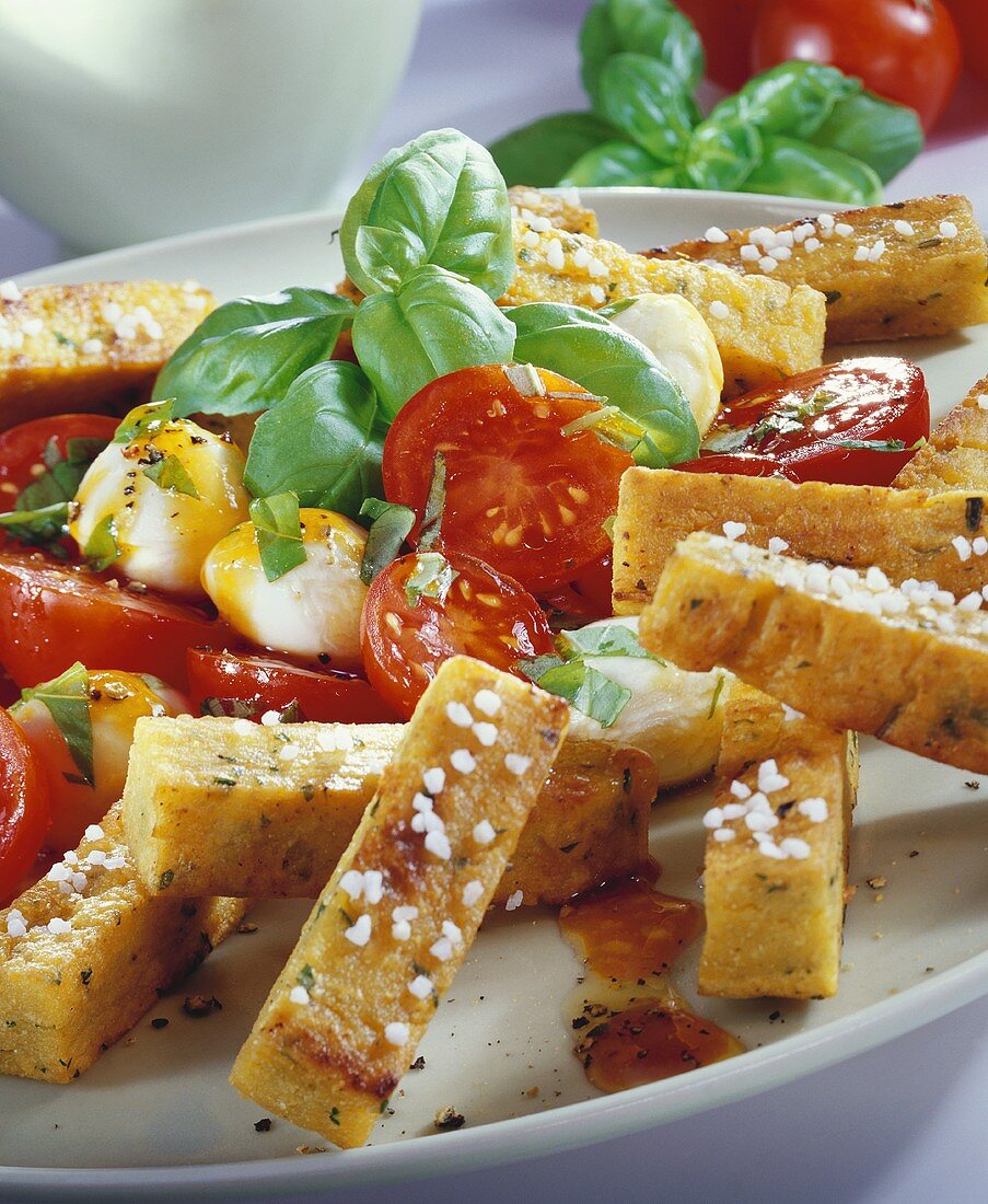 Chick-pea chips with tomatoes, mozzarella and basil