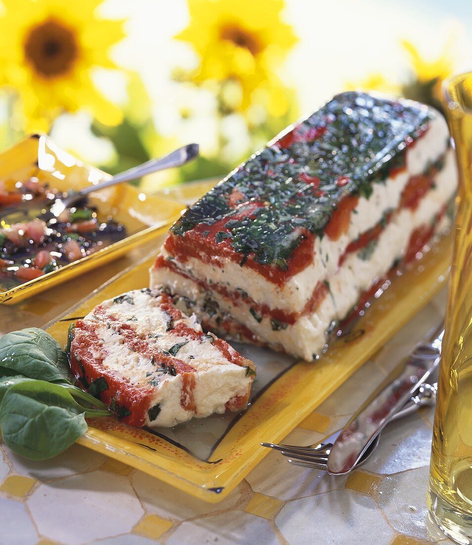 Fresh goat's cheese terrine with red peppers