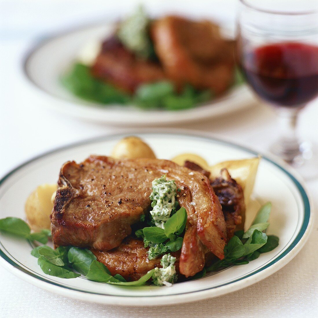 Lamb chops with herb butter and watercress