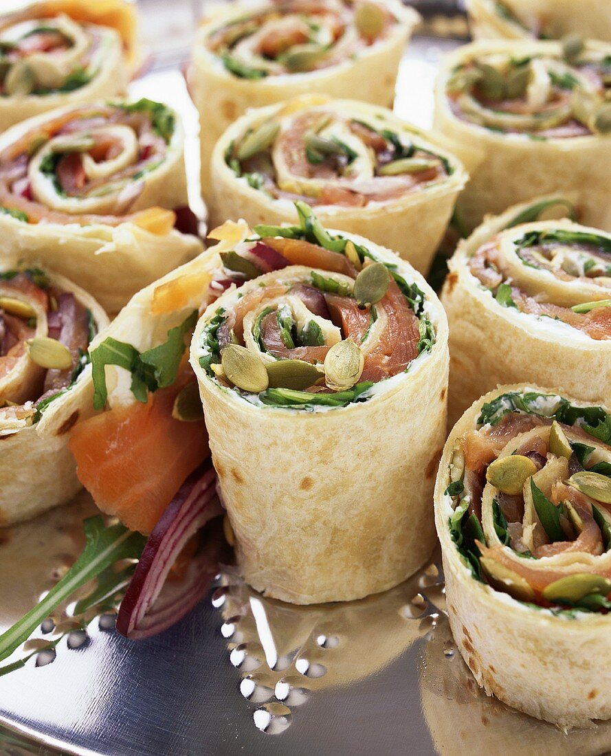 Wraps filled with smoked salmon and pumpkin seeds