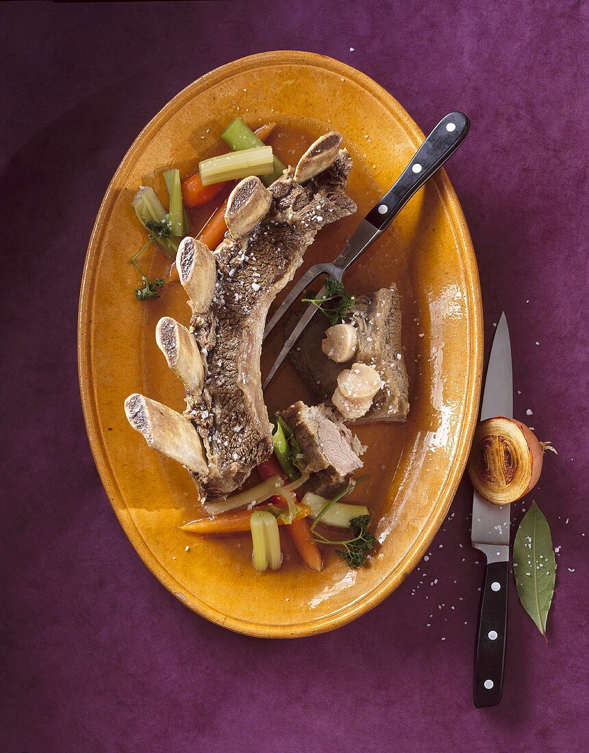 Beef with marrow bones and soup vegetables