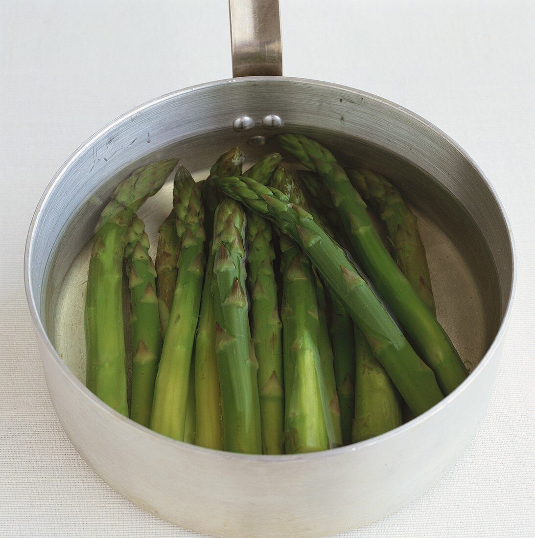 Green asparagus in a pan