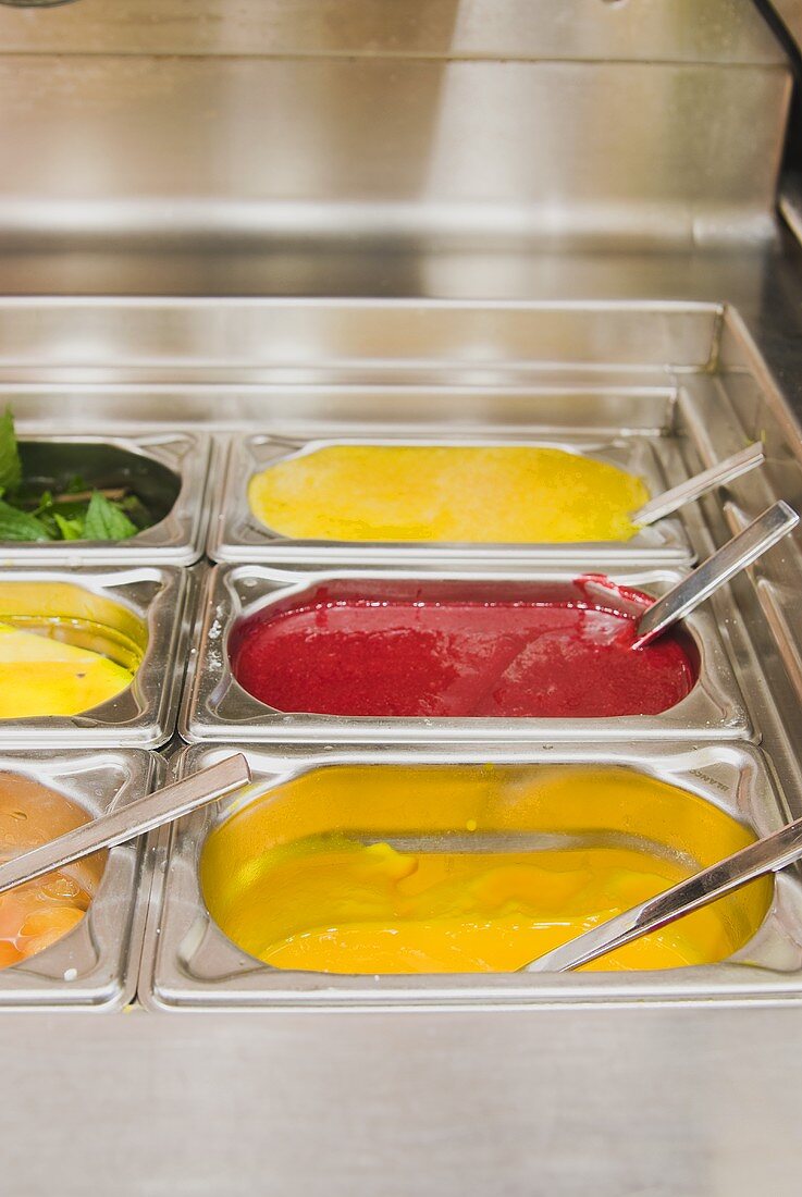 Various sauces in a commercial kitchen
