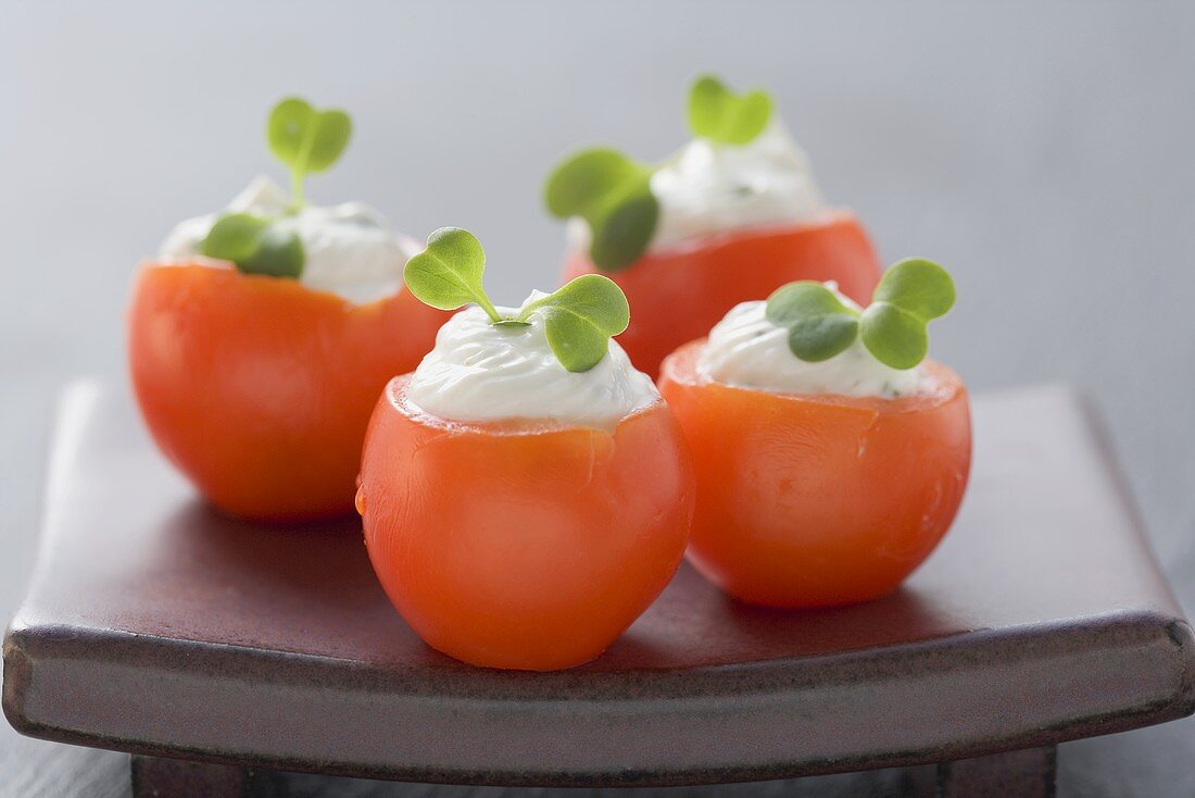 Tomatoes with soft cheese stuffing and cress