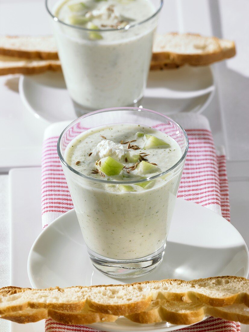 Cold cucumber soup with sheep's cheese, cumin & flatbread