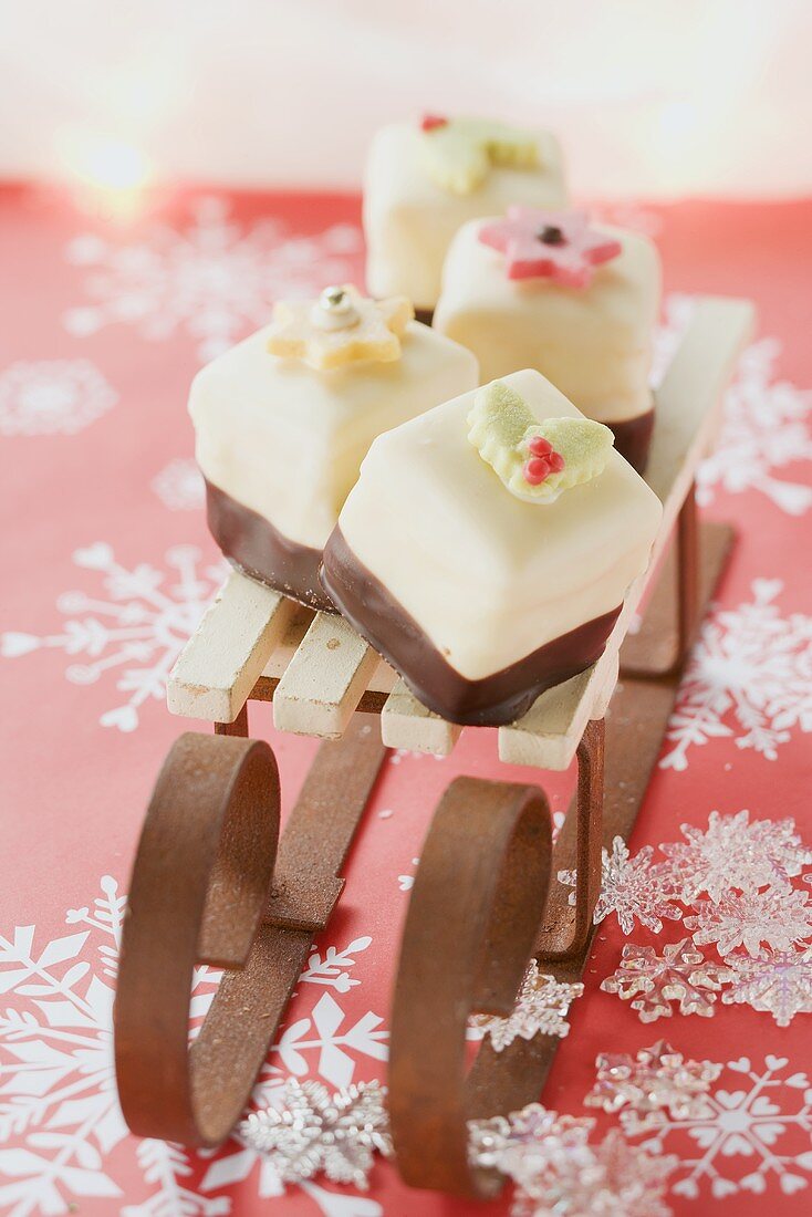Petit fours on small sleigh (for Christmas)