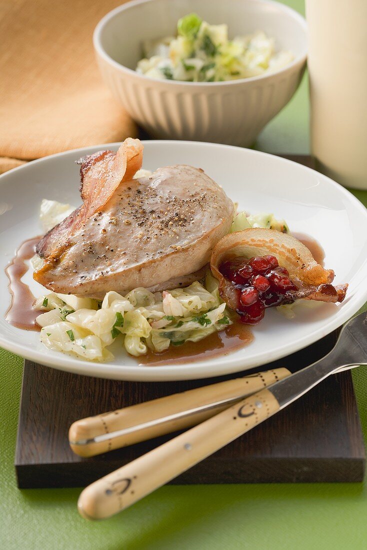Pheasant breast with cabbage, bacon and cranberries
