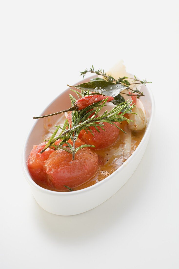 Braised tomatoes with Parmesan and herbs