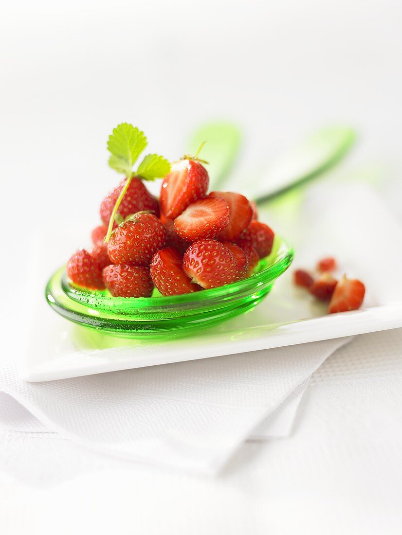 Strawberries on salad servers