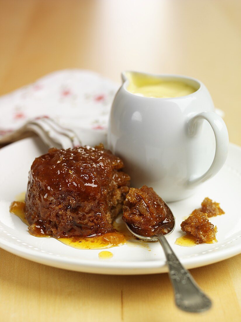 Ingwerpudding und Kännchen Vanillesauce