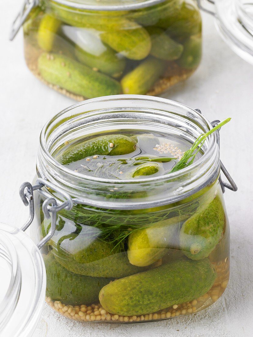 Pickled gherkins in jars