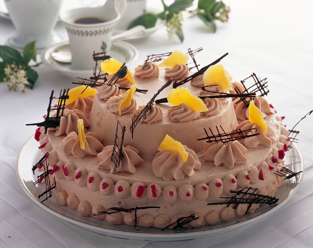 Festive grenadine cake with mango and pomegranate seeds