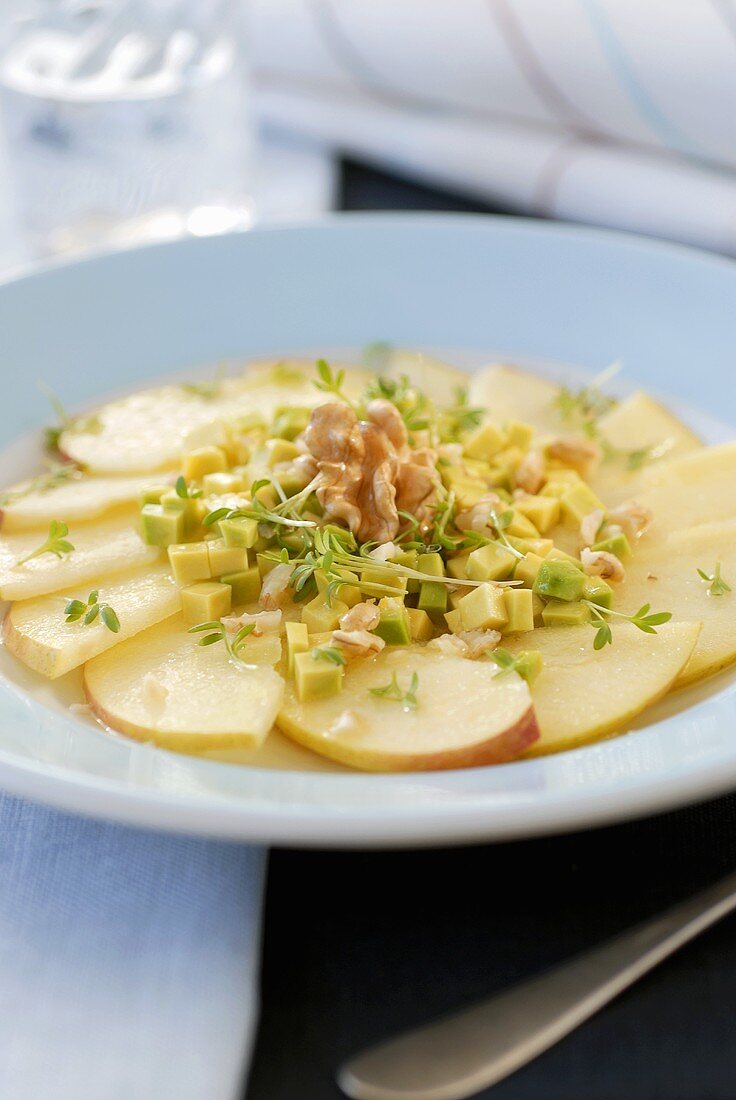 Apple and avocado carpaccio with cress and walnuts