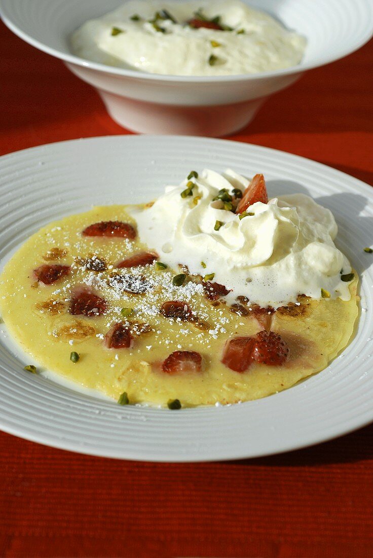 Strawberry and lemon omelette with cream