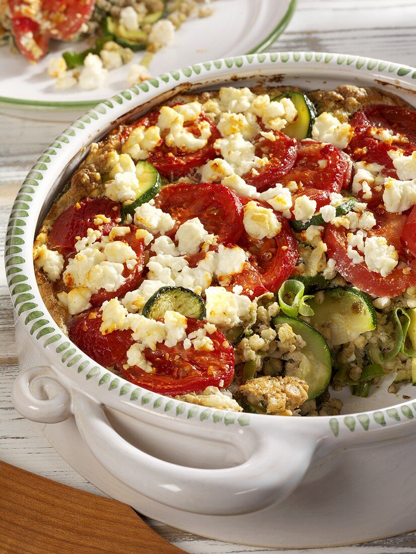 Courgette bake with buckwheat, tomatoes and feta