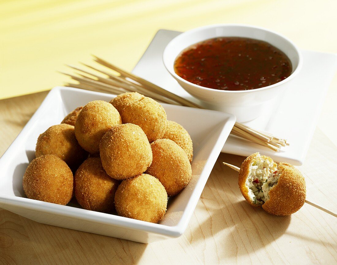 Deep-fried cheese balls with chilli sauce