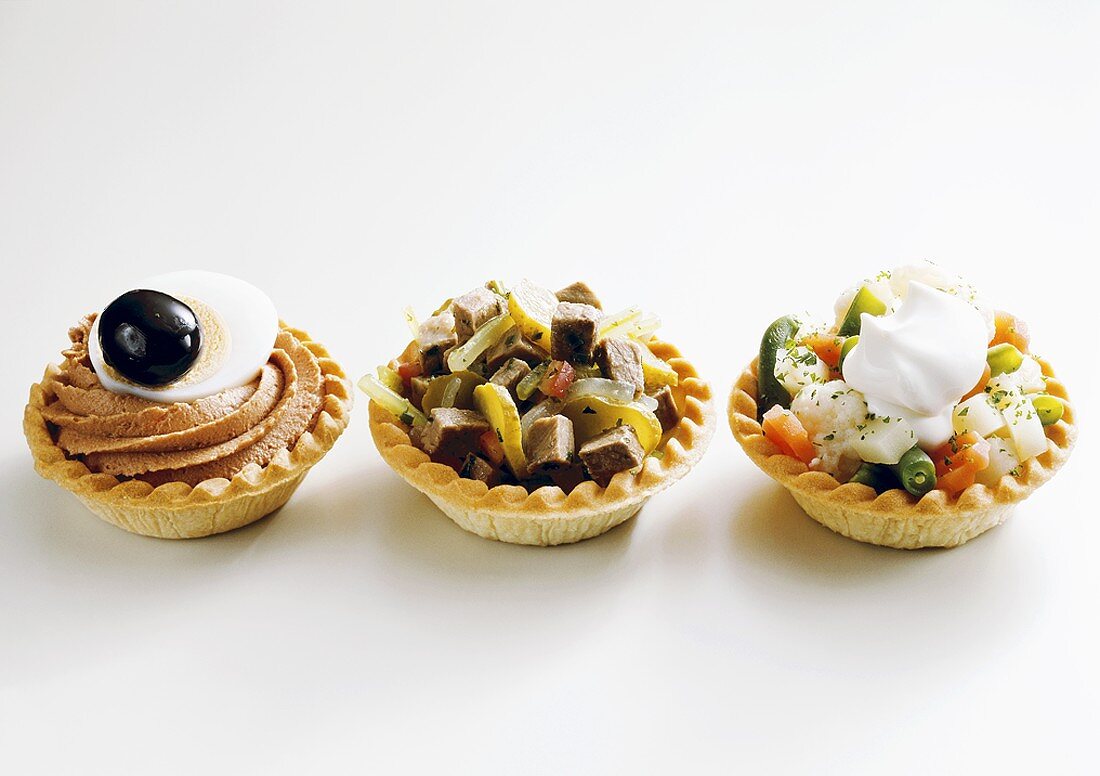 Three savoury tartlets