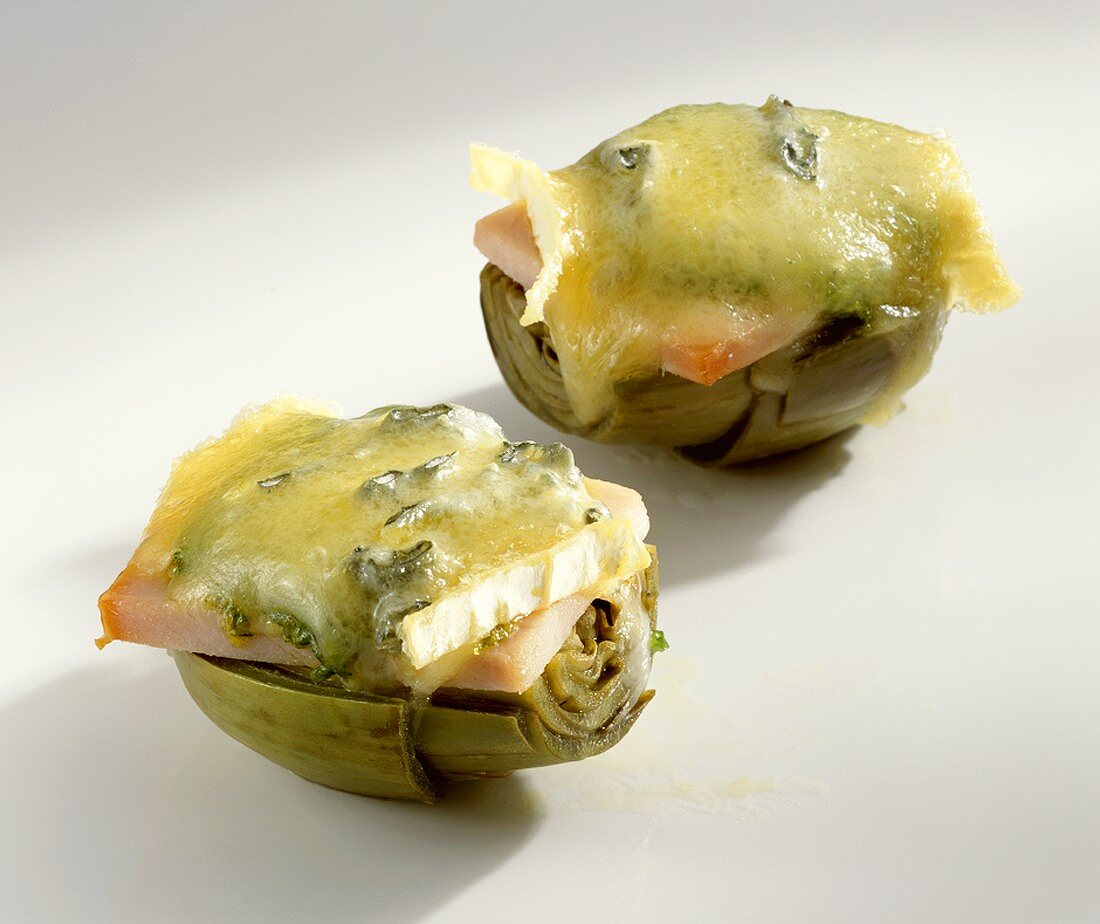Artichokes topped with kassler (cured pork) & toasted cheese