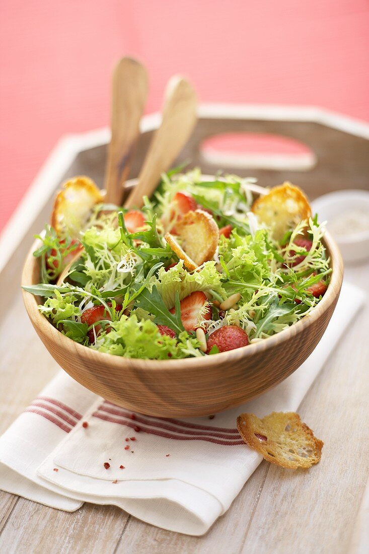 Salad leaves with strawberries