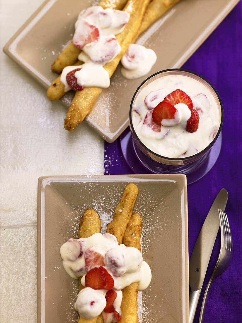 Sweet asparagus fritters with strawberries and cream