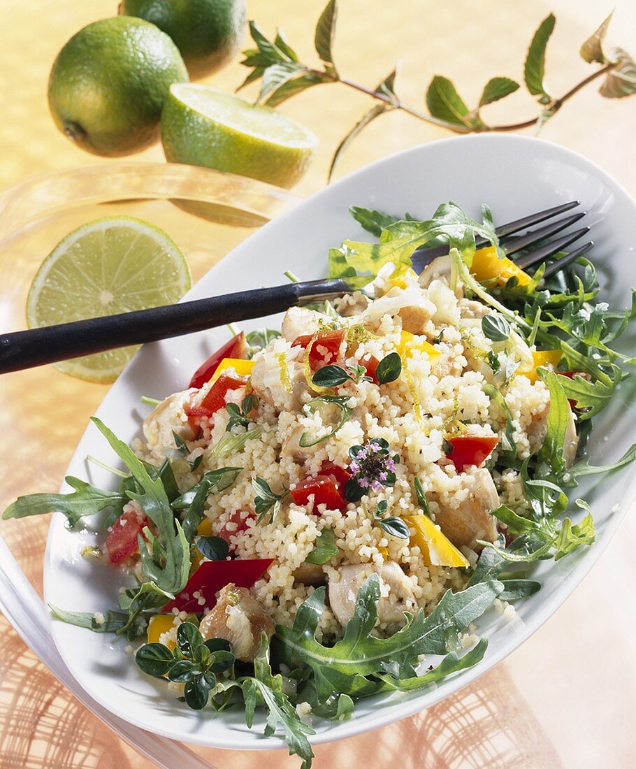 Couscous salad with chicken, rocket and lime