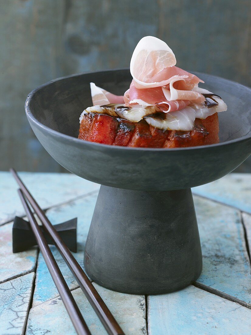 Fried watermelon with raw ham