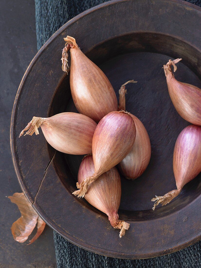 Shallots on plate (overhead view)