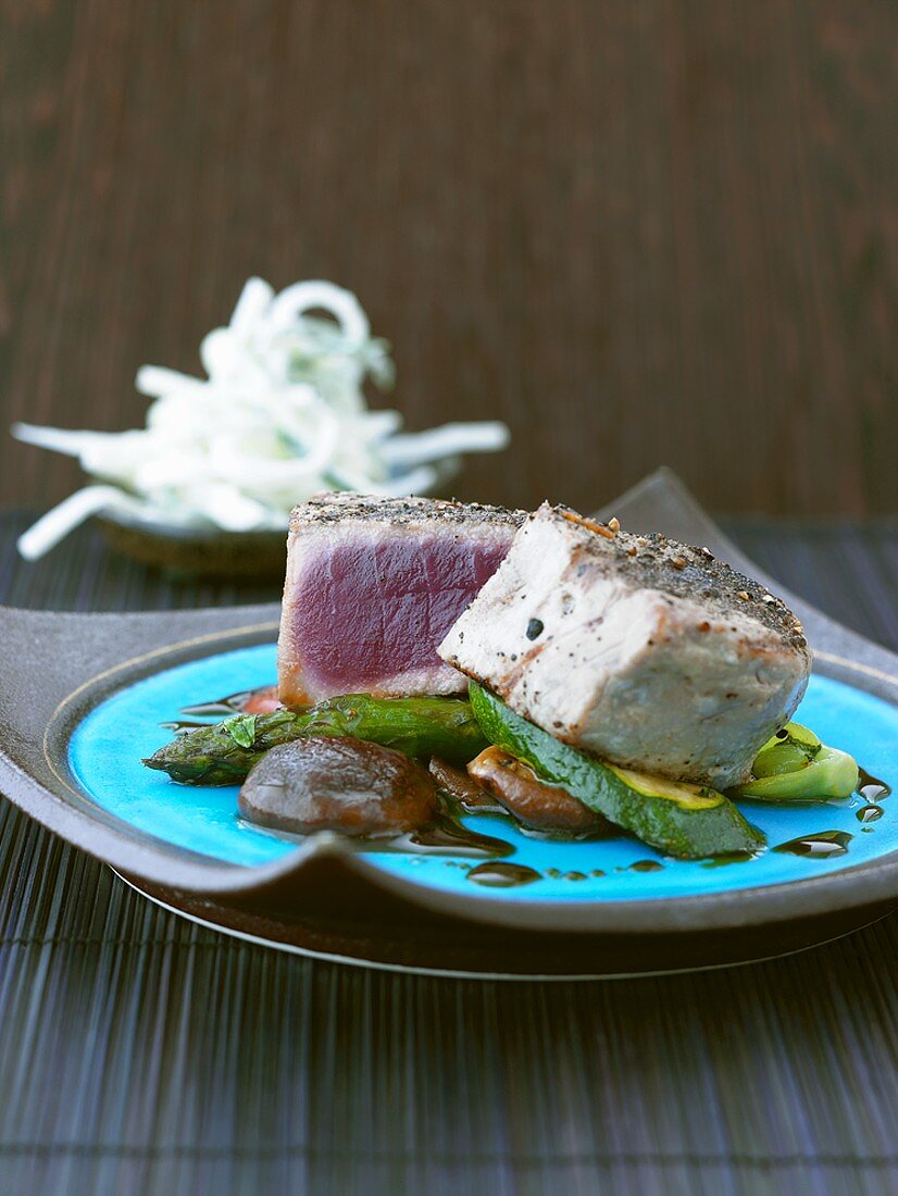 Tuna steak on teriyaki vegetables