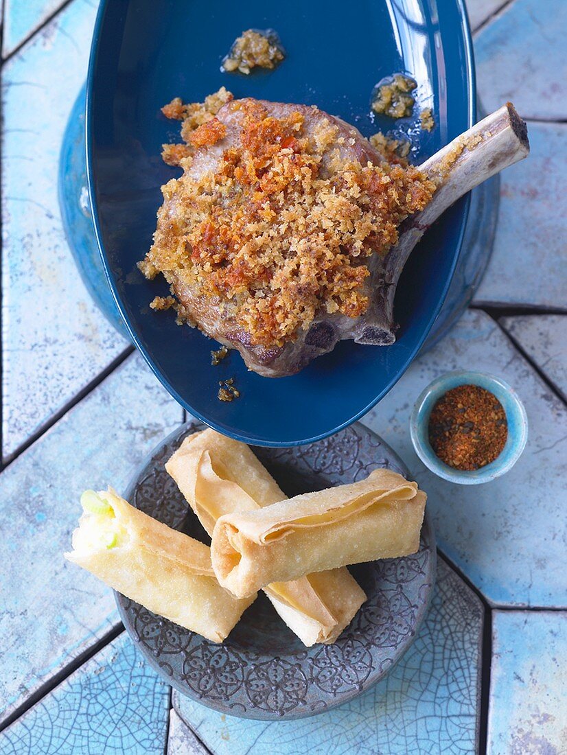 Veal with miso and mustard crust and spring rolls