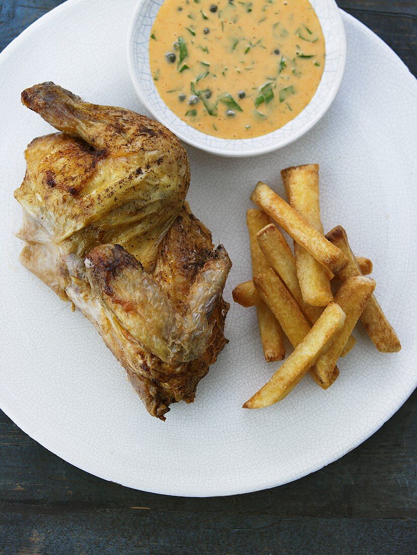 Chicken with chips and herb sauce