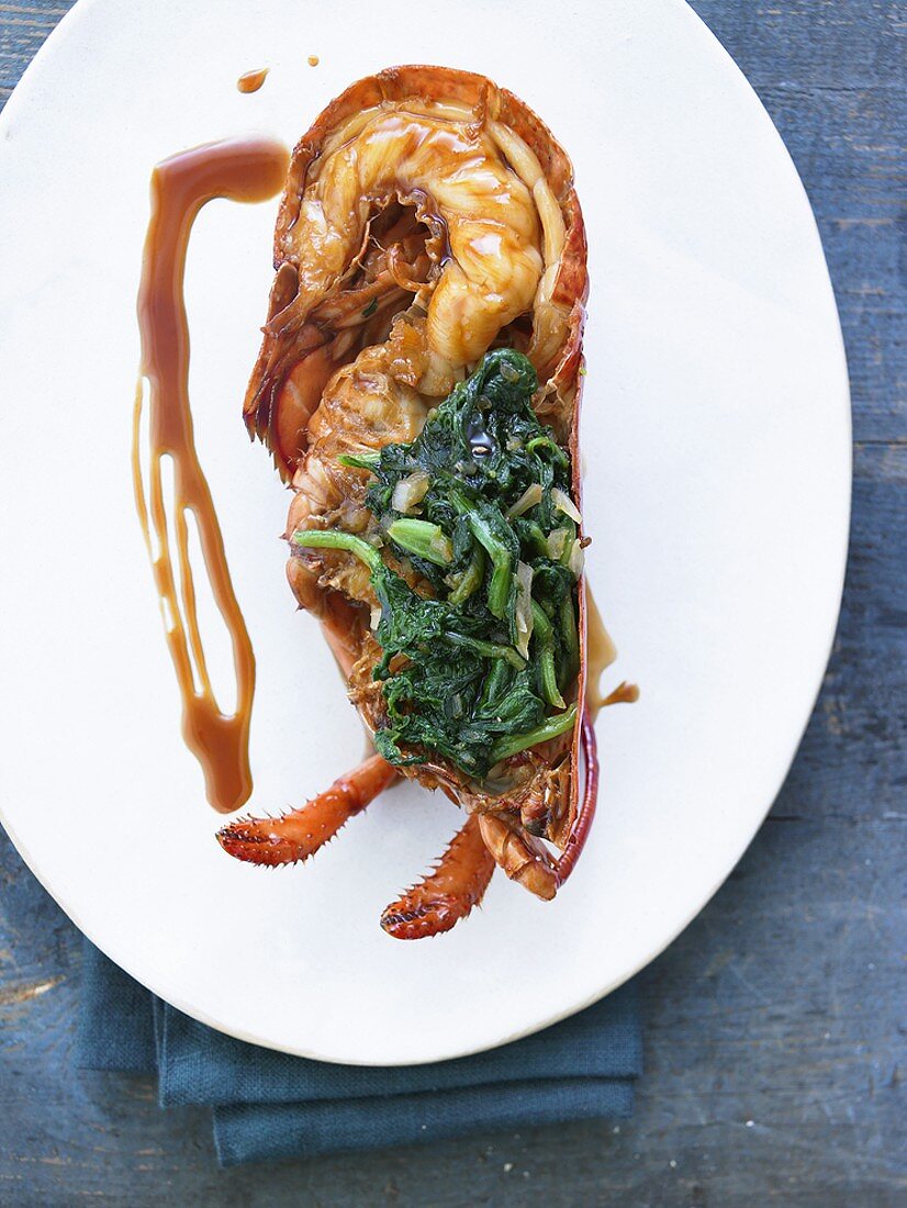 Glazed lobster with spinach and teriyaki sauce