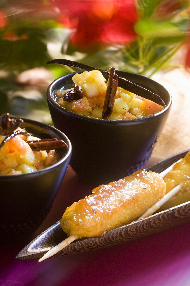 Fruit salad with cinnamon sticks