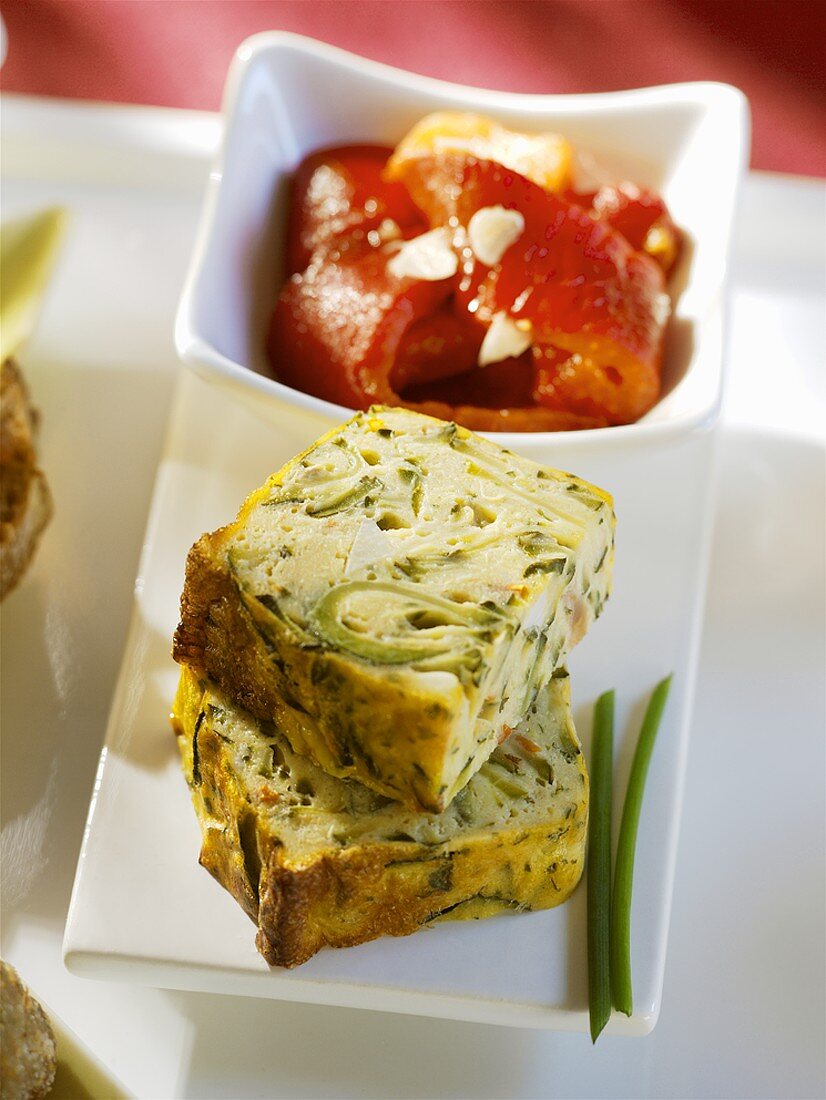 Courgette terrine with marinated peppers