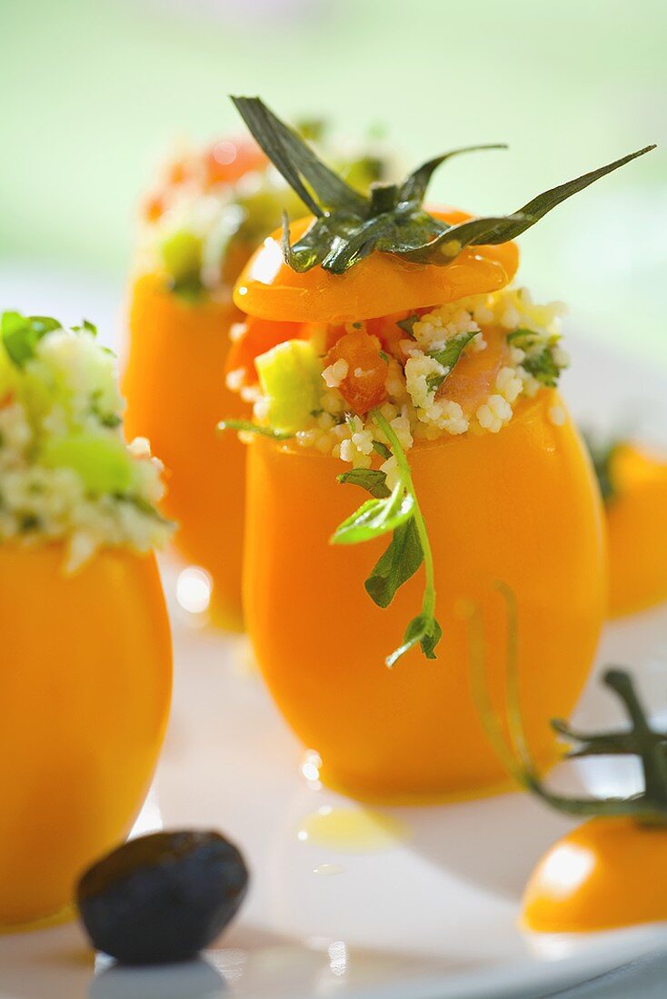 Yellow tomatoes stuffed with couscous