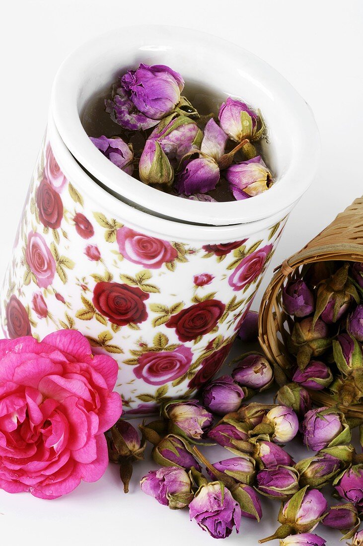 Dried rosebuds in containers