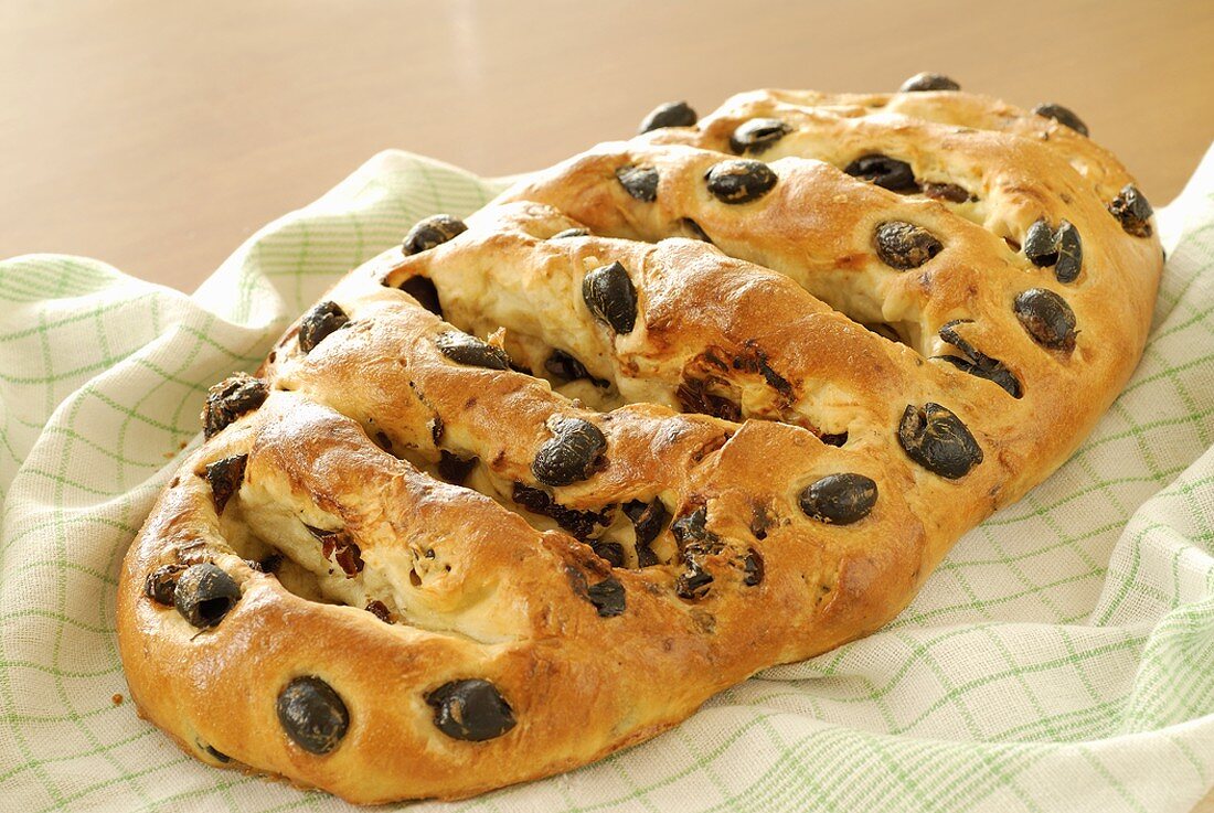 Olive bread on tea towel