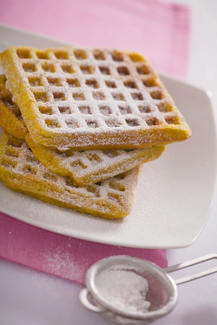 Waffles sprinkled with icing sugar