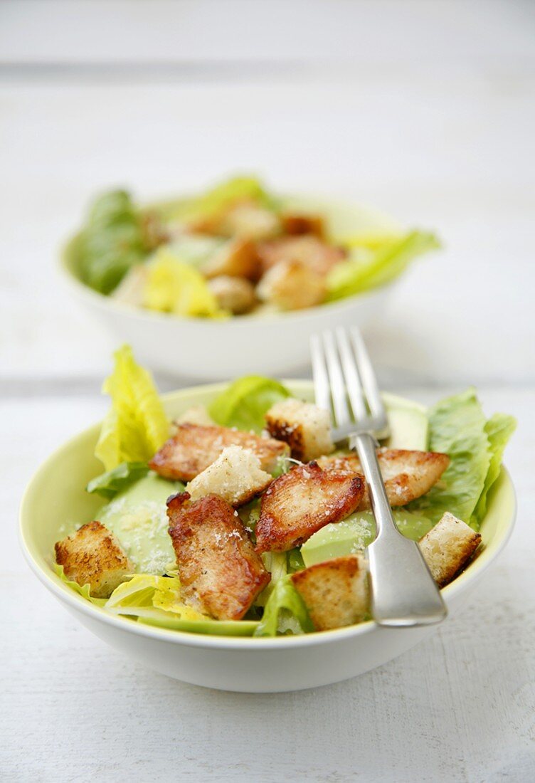 Caesar salad with chicken, avocado and croutons