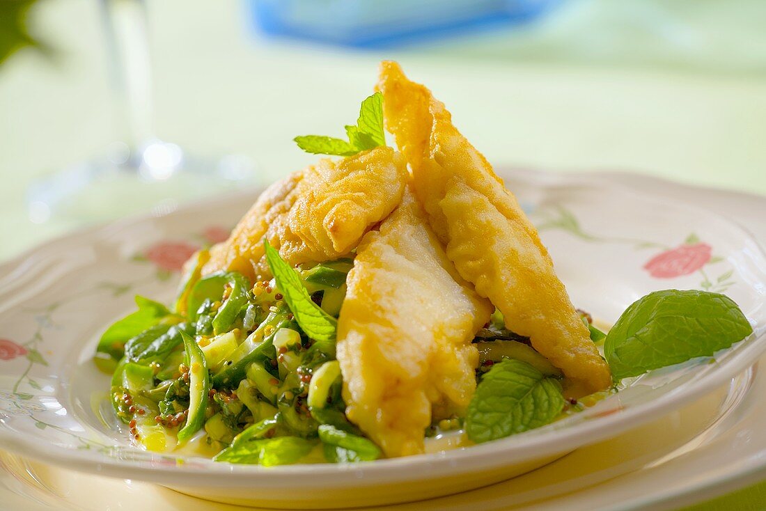 Deep-fried cod fillets with minted cabbage salad