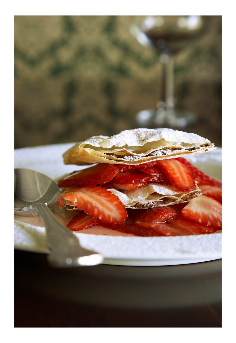 Macadamia filo tart with strawberries and rose syrup