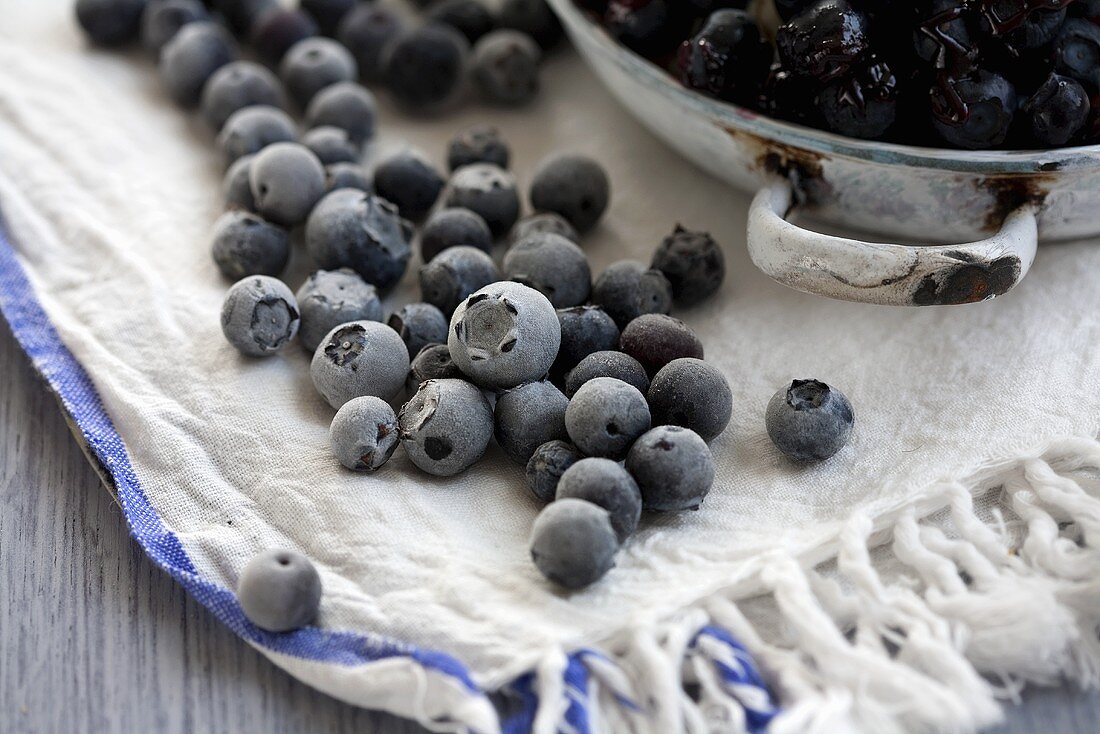 Frozen blueberries on a dish cloth