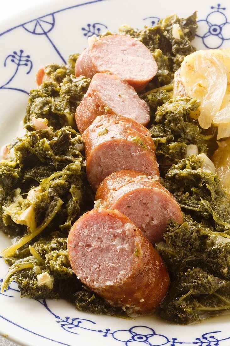 Green cabbage with Mettwurst (cured and smoked raw minced pork sausage from Germany)