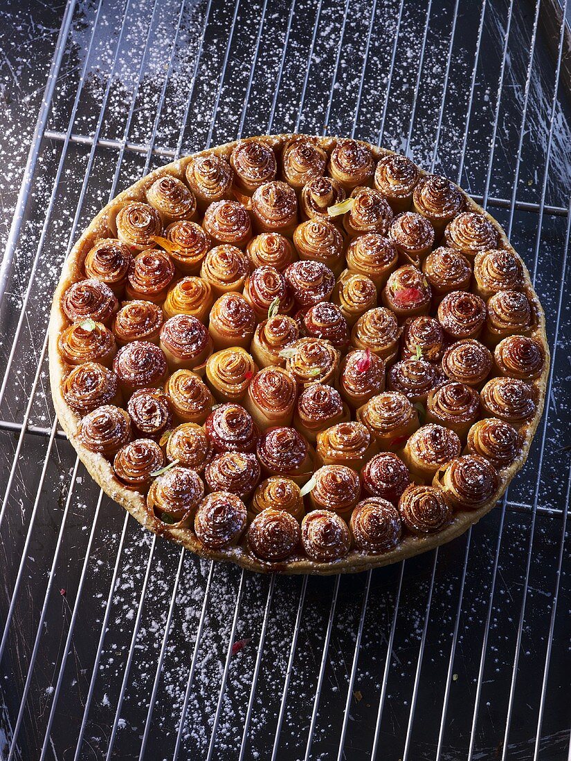 An apple tart shaped like a bouquet of roses