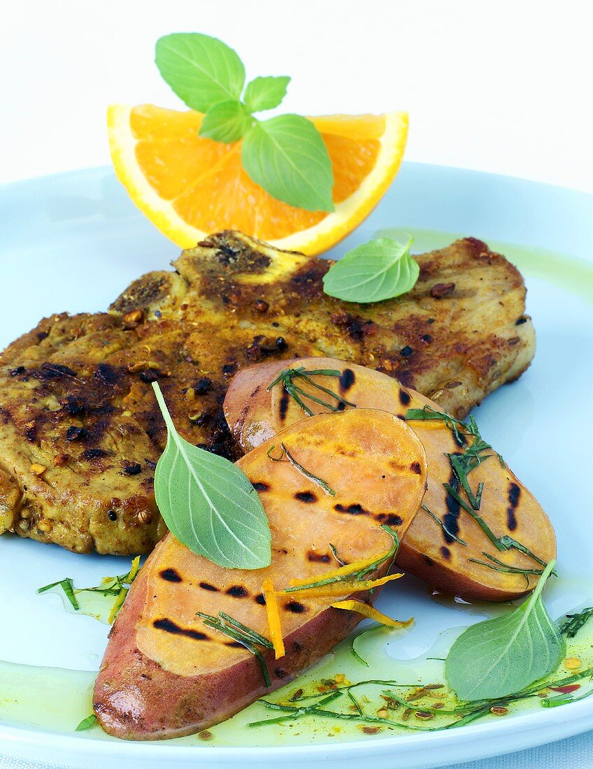 Pork chop with orange marinade and sweet potatoes