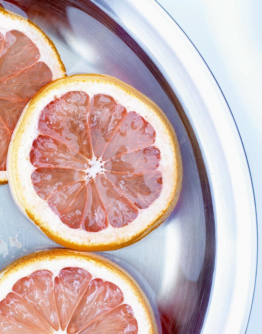 Slices of citrus fruit in syrup (for candying)