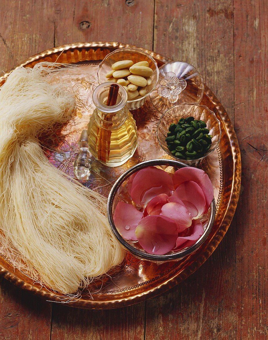 Turkish dessert ingredients: shredded dough, rose petals