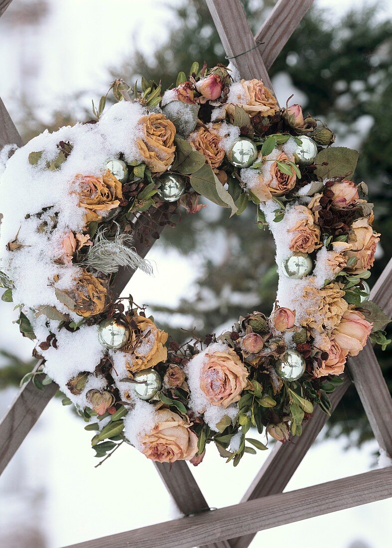 Dry wreath with roses and silver baubles