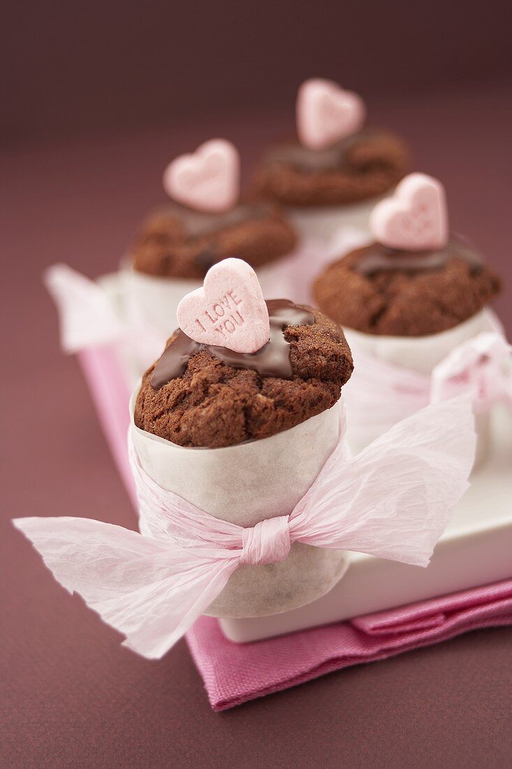 Chocolate muffins with pink sugar hearts