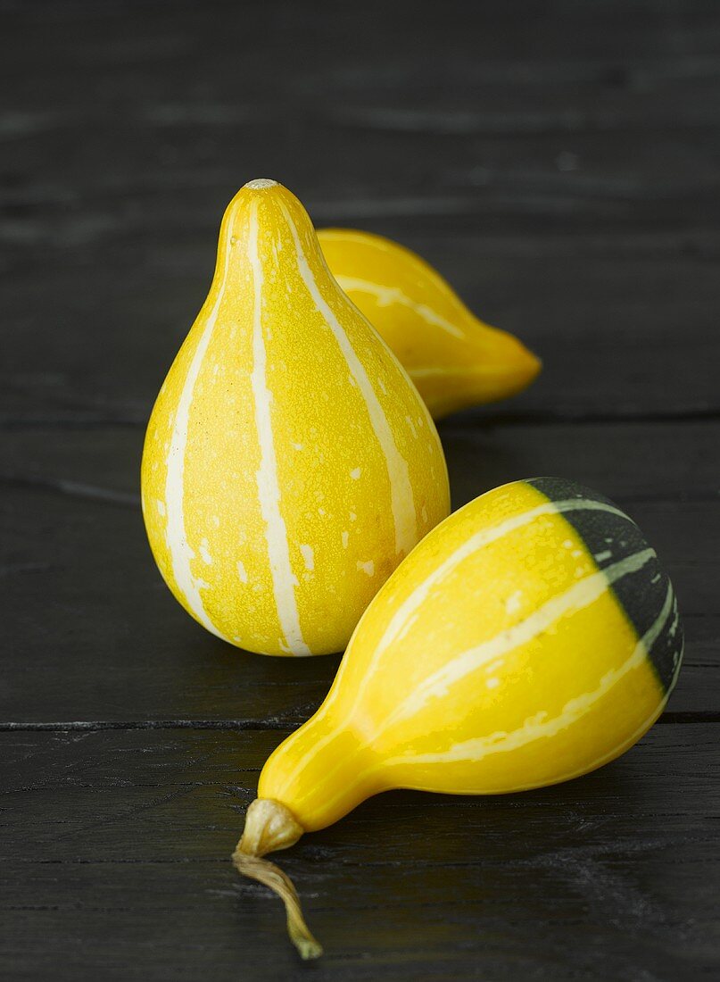 Three yellow ornamental gourds