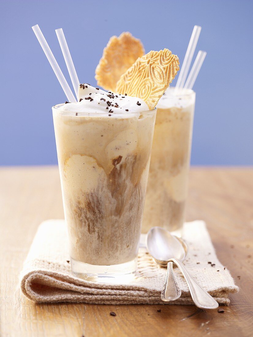 Two glasses of Eiskaffee (coffee with ice cream) with wafers